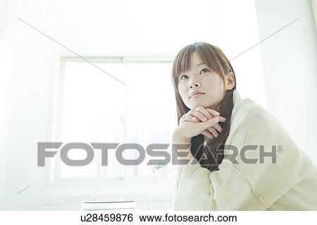Stock Photograph - Young woman. Fotosearch