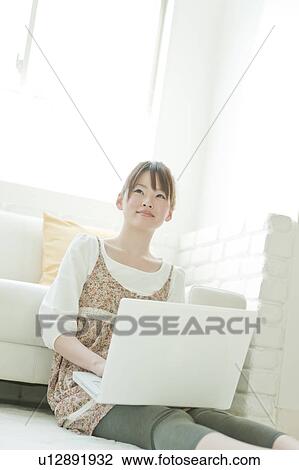 Young Woman Using Laptop View Large Photo Image Stock Image - Young Woman Using Laptop. Fotosearch