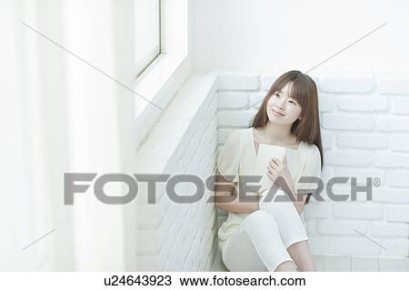 Young woman with Book View Large Photo Image Stock Image - Young woman with Book. Fotosearch