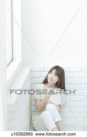 Young woman with Book View Large Photo Image Stock Photography - Young woman with Book. Fotosearch