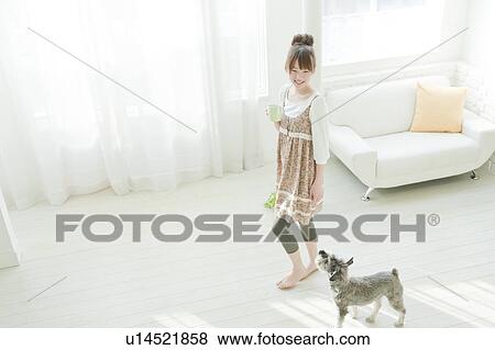 Young Woman with Miniature Schnauzer View Large Photo Image Stock Photo - Young Woman with Miniature Schnauzer. Fotosearch