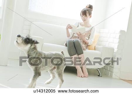 Young Woman with Miniature Schnauzer Reading Book View Large Photo Image Stock Photography - Young Woman with Miniature Schnauzer Reading Book. Fotosearch
