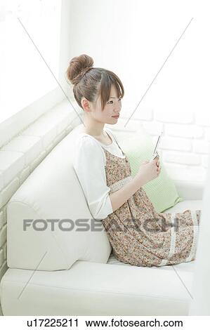 Young Woman with Mobile Phone View Large Photo Image Stock Image - Young Woman with Mobile Phone. Fotosearch