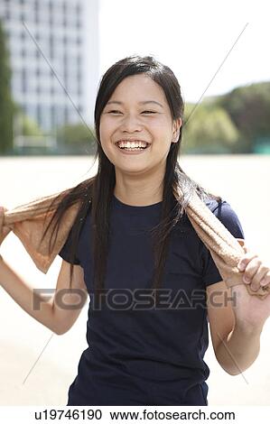Young Woman with Towel Around Her Neck View Large Photo Image Stock Image - Young Woman with Towel Around Her Neck. Fotosearch