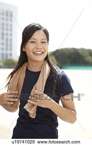 Young Woman with Towel Around Her Neck View Large Photo Image Stock Photo - Young Woman with Towel Around Her Neck. Fotosearch