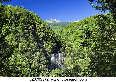 Stock Image - Zen Goro Waterfall and Mt Norikura. Fotosearch
