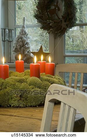 Picture - Advent wreath with burning candles. Fotosearch