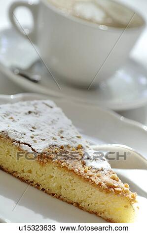 Almond cake and cup of coffee View Large Photo Image Stock Image - Almond cake and cup of coffee. Fotosearch