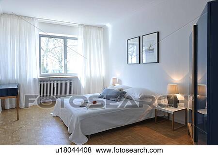 Apple and newspaper on bed View Large Photo Image Stock Photo - Apple and newspaper on bed. Fotosearch