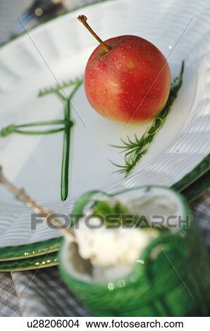 Apple on plate View Large Photo Image Picture - Apple on plate. Fotosearch