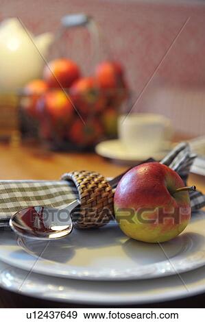 Apple, spoon and napkin on plate View Large Photo Image Stock Photo - Apple, spoon and napkin on plate. Fotosearch