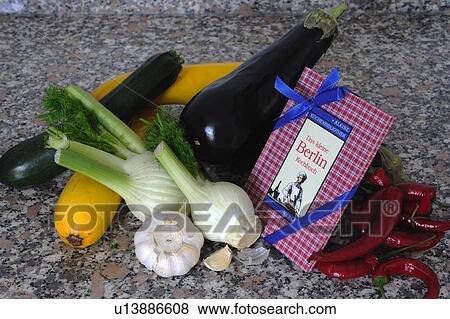 Assortment of vegetables and cookbook View Large Photo Image Stock Photo - Assortment of vegetables and cookbook. Fotosearch