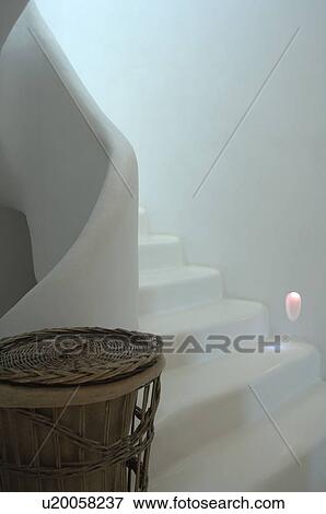 Basket at staircase View Large Photo Image Stock Photo - Basket at staircase. Fotosearch