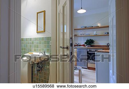 Bathroom and kitchen in an apartment View Large Photo Image Stock Photo - Bathroom and kitchen in an apartment. Fotosearch
