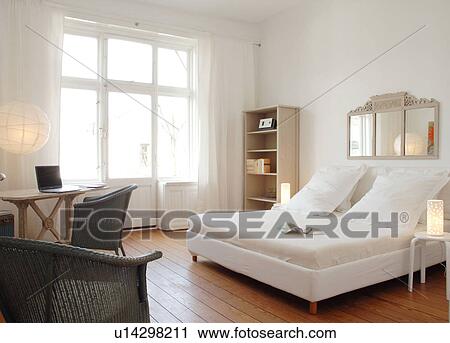 Bedroom With Mirror Above The Bed Stock Image U14298211