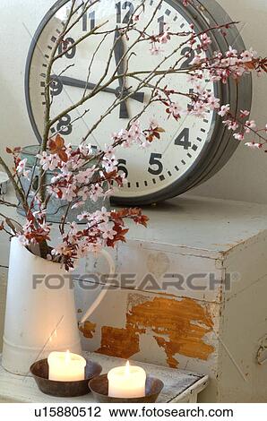 Blooming branches, candles and clock View Large Photo Image Stock Image - Blooming branches, candles and clock. Fotosearch