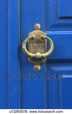 Stock Photo - Blue door with door knocker. Fotosearch