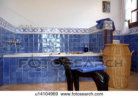 Stock Photo - Blue tiled bathtub. Fotosearch