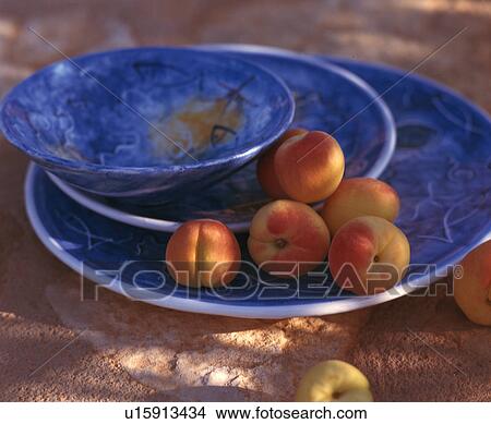 Bowl and plate with apricots View Large Photo Image Picture - Bowl and plate with apricots. Fotosearch