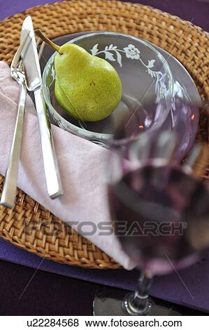 Bowl with pear and drinking glass View Large Photo Image Stock Photo - Bowl with pear and drinking glass. Fotosearch