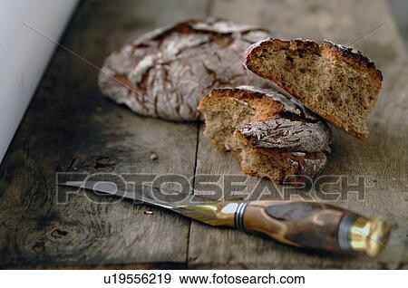 Stock Photo - Bread and kitchen knife. Fotosearch
