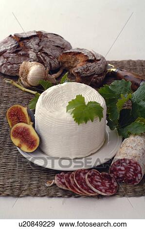 Stock Photo - Bread, figs, feta and salami. Fotosearch