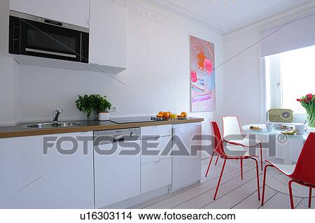Picture - Bright kitchen with dining area. Fotosearch