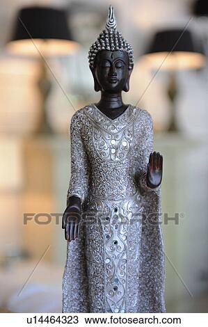 Stock Image - Buddha statuette. Fotosearch