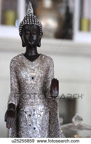 Stock Photo - Buddha statuette. Fotosearch