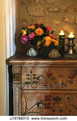 Bunch of flowers and candles on dresser View Large Photo Image Stock Photography - Bunch of flowers and candles on dresser. Fotosearch
