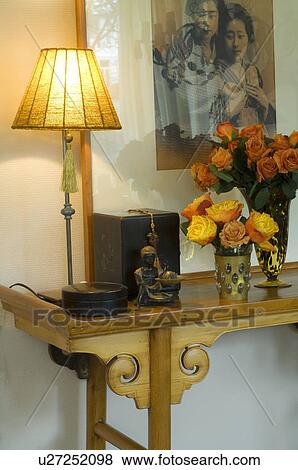 Bunch of flowers and table lamp View Large Photo Image Stock Photo - Bunch of flowers and table lamp. Fotosearch
