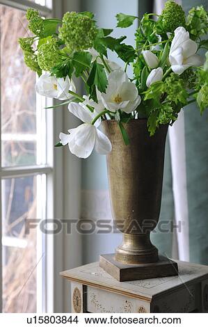 Picture - Bunch of flowers at the window. Fotosearch