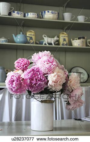 Stock Photo - Bunch of flowers in a jug. Fotosearch