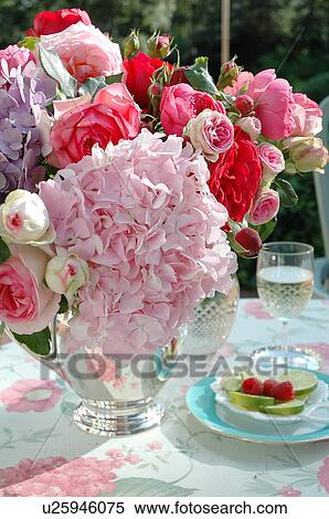 Bunch of flowers on garden table View Large Photo Image Stock Photography - Bunch of flowers on garden table. Fotosearch