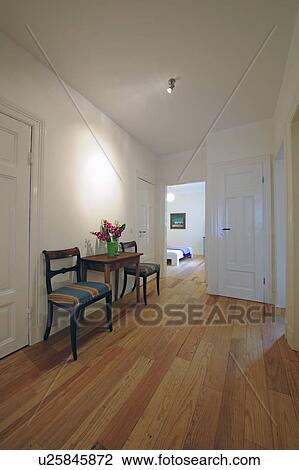 Bunch of flowers, table and chairs on corridor View Large Photo Image Stock Image - Bunch of flowers, table and chairs on corridor. Fotosearch