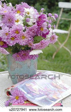 Stock Image - Bunch of flowers with clover and Dahlia. Fotosearch