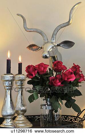 Bunch of roses, candles and deer antler View Large Photo Image Stock Photograph - Bunch of roses, candles and deer antler. Fotosearch