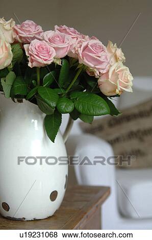 Stock Photo - Bunch of roses in jug. Fotosearch