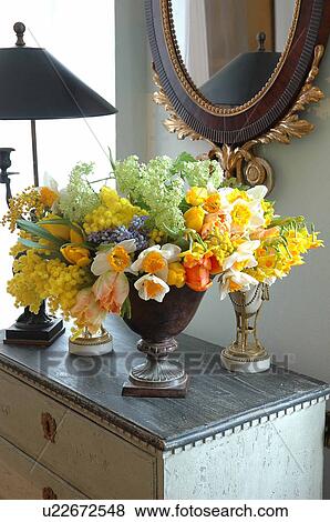 Bunches of flowers on dresser View Large Photo Image Stock Photo - Bunches of flowers on dresser. Fotosearch