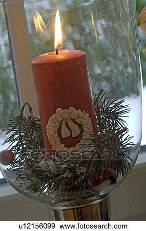 Stock Photo - Burning candle in glass. Fotosearch