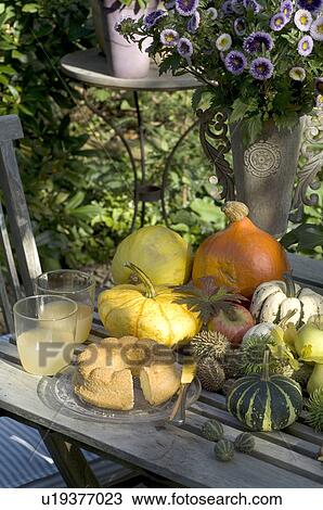 Cake and fruit and vegetables on garden table View Large Photo Image Stock Image - Cake and fruit and vegetables on garden table. Fotosearch