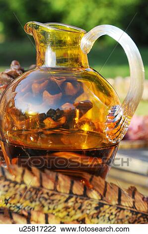 Carafe with beverage outdoors View Large Photo Image Stock Image - Carafe with beverage outdoors. Fotosearch