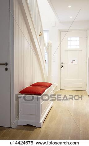 Stock Photograph - Chest with cushions on the floor. Fotosearch