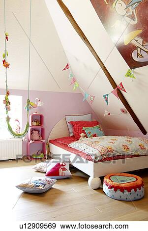 Childrens room with bed and cushions View Large Photo Image Stock Photo - Childrens room with bed and cushions. Fotosearch