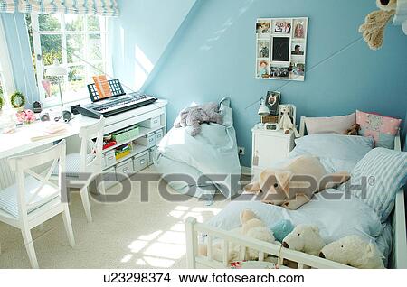 Childrens room with blue walls View Large Photo Image Picture - Childrens room with blue walls. Fotosearch