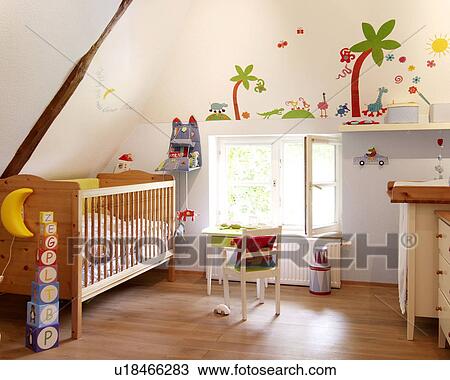 Childrens room with crib and painted wall View Large Photo Image Stock Image - Childrens room with crib and painted wall. Fotosearch