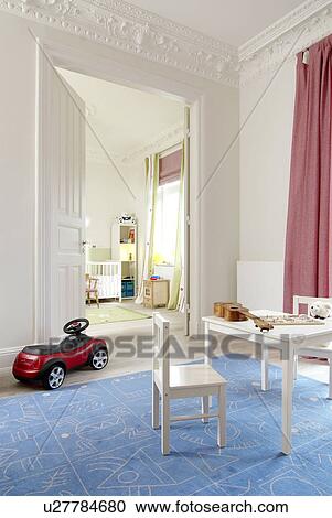 Childrens room with toy car and guitar on table View Large Photo Image Stock Image - Childrens room with toy car and guitar on table. Fotosearch