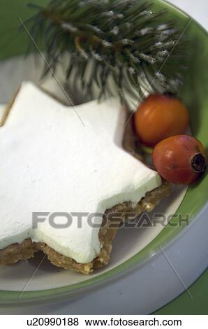 Christmas biscuit and fruit on plate View Large Photo Image Stock Photo - Christmas biscuit and fruit on plate. Fotosearch