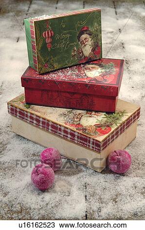 Christmas decoration with boxes and apples View Large Photo Image Stock Image - Christmas decoration with boxes and apples. Fotosearch
