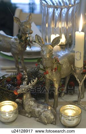 Christmas decoration with deer figurines and candles View Large Photo Image Stock Photo - Christmas decoration with deer figurines and candles. Fotosearch